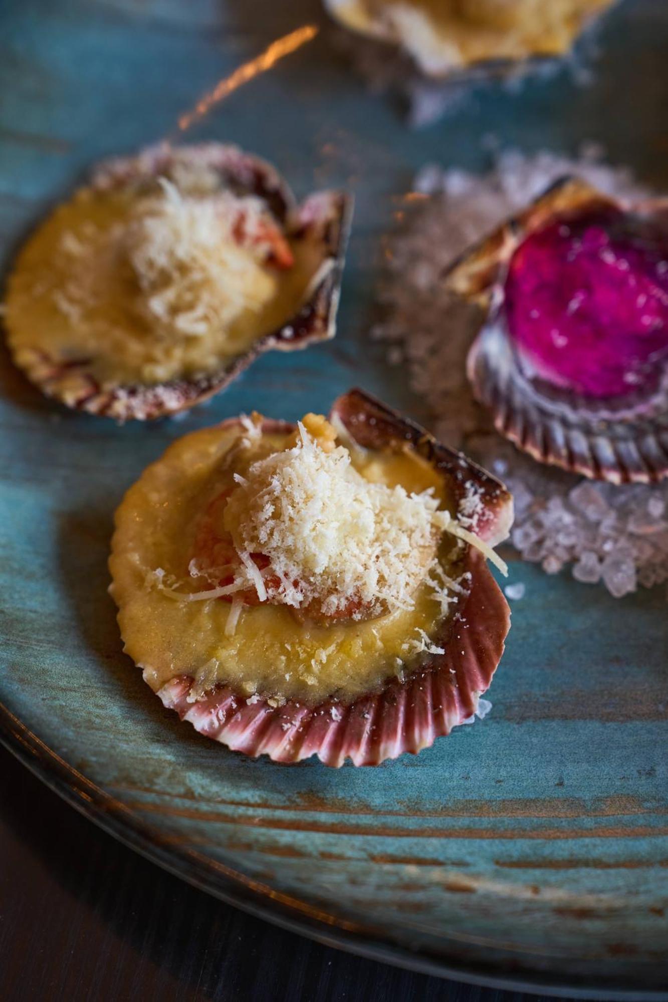 Pullman Santiago Vitacura Bagian luar foto A baked scallop